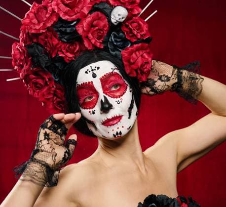 portrait of a beautiful woman with a sugar skull makeup with a wreath of flowers on her head, red background portrait of a beautiful woman with a sugar skull makeup with a wreath of flowers on her head, red background ,model released, Symbolfoto Copyright: xZoonar.com DANK0xNNx 17825712 ,model released, Symbolfoto ,property released