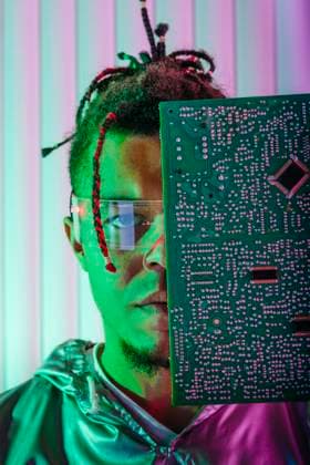 Creative Highlights Symbolbilder Man wearing smart glasses covering face with computer chip model released, Symbolfoto property released, YTF01363