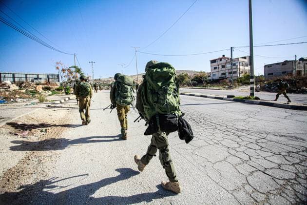 Palestinian- Israeli Conflict in Nablus, Palestine - 23 Nov 2023 Israeli soldiers on foot storm the Balata refugee camp during a large-scale raid in the Balata refugee camp to arrest wanted Palestinians east of Nablus in the northern West Bank. Nablus Palestine Copyright: xNasserxIshtayehx xSOPAxImagesx _MG_7479