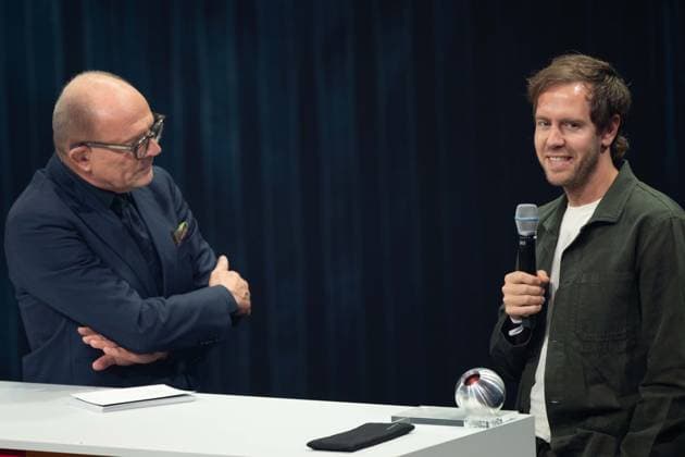 Stefan SCHULZE HAUSMANN, Chairman of the Board of the German Sustainability Award Foundation in conversation with Sebastian VETTEL, German Sustainability Award ceremony in Duesseldorf on 24 11 2023