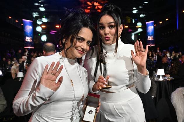 Polish-Czech singer Ewa Farna, right, won the female singer category of the Czech Nightingale music poll in Prague, Czech Republic, November 24, 2023. Czech singer Lucie Bila, left, took second place. (CTKxPhoto MichaelaxRihova) CTKPhotoP2023112407713  CTKPhotoP2023112407713