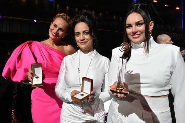 Polish-Czech singer Ewa Farna, right, won the female singer category of the Czech Nightingale music poll in Prague, Czech Republic, November 24, 2023. Czech singer Lucie Bila, center, took second place and Monika Absolonova, left, took third place. (CTKxPhoto MichaelaxRihova) CTKPhotoP2023112407949  CTKPhotoP2023112407949