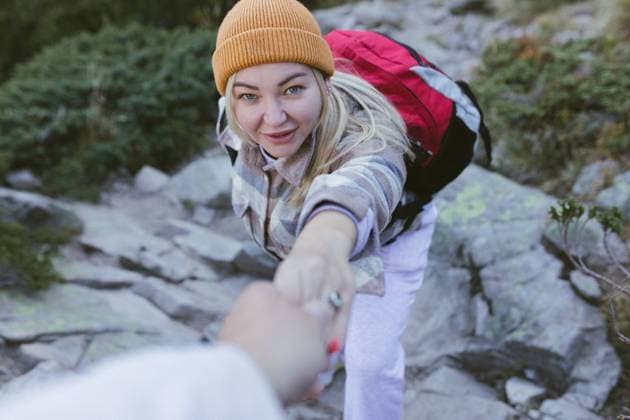first person view of a female traveler climbing a rock, Bansko, Blagoevgrad Province, Bulgaria R_PUZV231201-1298104-01 ,model released, Symbolfoto