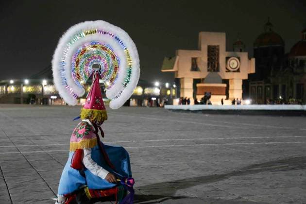 December 9, 2023, Mexico City, Mexico City, Mexico: Tufts of some members of the dance of the Quetzals, during their arrival at the Basilica of Guadalupe as part of their pilgrimage and celebrations in honour of the Virgin Mary on 12 December. Mexico City Mexico - ZUMAs310 20231209_zip_s310_016 Copyright: xLuisxExSalgadox