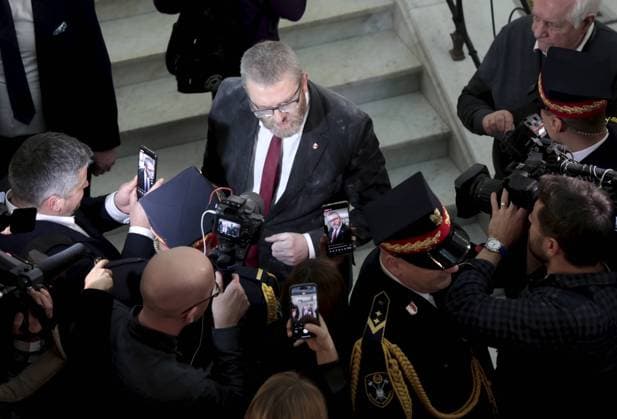 Anti-Semitic incident in Polish parliament Photo: Piotr Molecki East News MP Grzegorz Braun of far-right Confederation party talks to journalists after using an extinguisher to put out candles lit on the Hanukkah menorah at parliamentary corridor during the session of the Polish Sejm (lower chamber of the Parliament) on December 12, 2023 in Warsaw, Poland. The menorah was lit during an earlier ceremony attended by Israel s ambassador to Poland Yacov Livne. EN_01605495_1013 