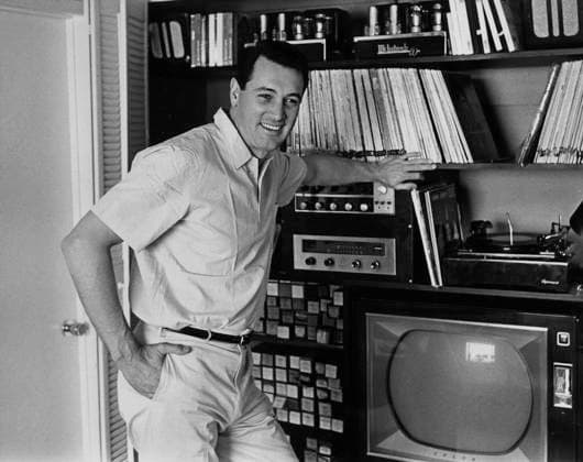 Rock Hudson at Home Actor Rock Hudson with records at his house Los Angeles, CA USA  Copyright: xLeoxFuchsx 0751 Hudson WITH TV PORTRAIT