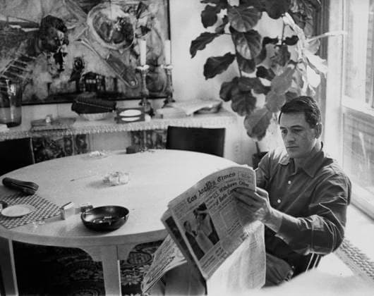 Rock Hudson at Home Actor Rock Hudson at his house Los Angeles, CA USA  Copyright: xLeoxFuchsx 0753 Hudson READS THE PAPER PORTRAIT