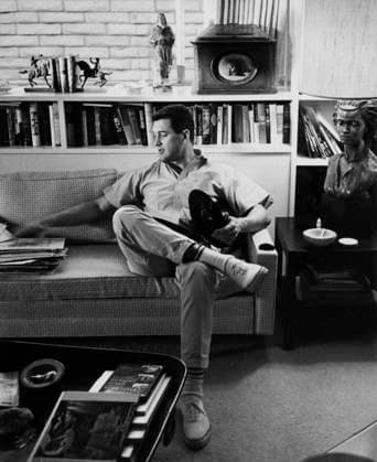Rock Hudson at Home Actor Rock Hudson with records at his house Los Angeles, CA USA  Copyright: xLeoxFuchsx 0754_hudson_holds_record_portrait