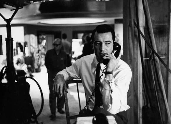 Film Lover Come Back Actor Rock Hudson takes a call while at the set Los Angeles, CA USA  Copyright: xLeoxFuchsx 0756_hudson_on_phone_set LCB