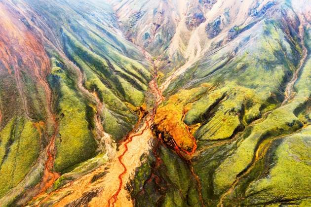 An aerial shot captures the stunning hues of Landmannalaugar s mountainous landscapes and meandering river basins in Iceland Model Released DavidJerez_ID17788_536913_015 Copyright: xDavidxJerezx RECORD DATE NOT STATED