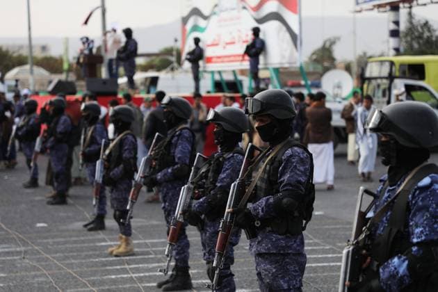 December 15, 2023, SANAA, Sanaa, Yemen: Yemen s Houthi-affiliated security forces stand guard during a march in solidarity with the people of Gaza in the capital Sanaa..The Houthis, who are aligned with Iran, have launched attacks on ships in the Red Sea and have used drones and missiles to target Israel since the beginning of the Israel-Hamas conflict in Gaza more than two months ago, raising concerns about a potential escalation of tensions in the Middle East..The group which rules much of Yemen has stated that its attacks are a demonstration of solidarity with the Palestinians and has pledged to sustain them until Israel ceases its military action in the Gaza Strip. SANAA Yemen - ZUMAa219 20231215_zip_a219_029 Copyright: xOsamahxYahyax