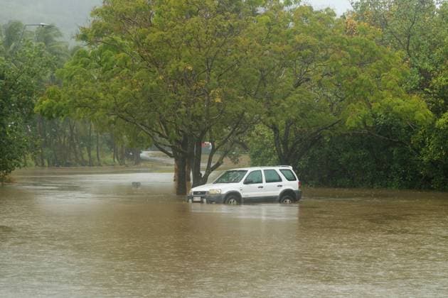 News Themen der Woche KW50 TROPICAL CYCLONE JASPER, A car inundated with water nearby the Barron River in Cairns, Saturday, December 16, 2023. Residents in flooded far north Queensland are bracing for more rain as ex-tropical cyclone Jasper edges its way toward the Northern Territory. ( NO ARCHIVING, EDITORIAL USE ONLY, NO USE IN BOOKS WITHOUT CONSENT CAIRNS QUEENSLAND AUSTRALIA  Copyright: xJOSHUAxPRIETOx 20231216001878595642
