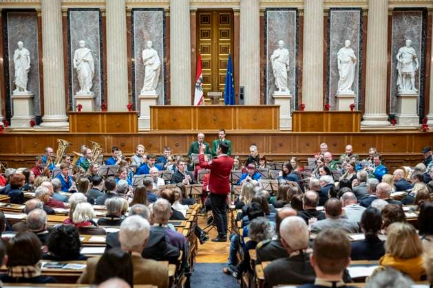 Vienna, Austria 18 December 2023 Austrian Wind Music Association provides musical accompaniment at the Christmas concert in the historic conference hall of the Federal Assembly to mark the focus on volunteering