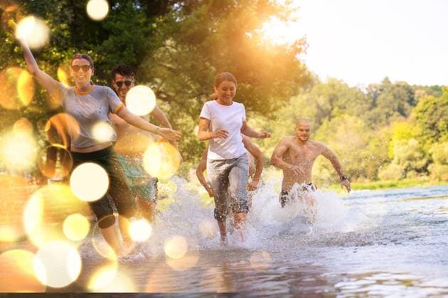 summer joy friends having fun on river summer joy group of happy friends having fun while running and splashing on river ,model released, Symbolfoto Copyright: xZoonar.com benisxarapovicx 14149632 ,model released, Symbolfoto ,property released