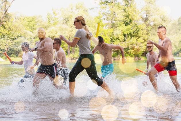 summer joy friends having fun on river summer joy group of happy friends having fun while running and splashing on river ,model released, Symbolfoto Copyright: xZoonar.com benisxarapovicx 14149647 ,model released, Symbolfoto ,property released