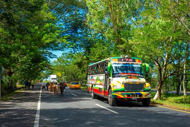 Panamericana interamericana road near San Miguel in El Salvador. The Pan-American Highway is a network of roads stretching across the American continents and measuring about 30,000 kilometres in total length. Except for a rainforest break of approximately 106 km in northwest Colombia, called the DariÃ n Gap, the roads link almost all of the Pacific coastal countries of the Americas in a connected highway system. Finally, on July 29, 1937, in the latter years of the Great Depression, Argentina, Bolivia, Chile, Colombia, Costa Rica, El Salvador, Guatemala, Honduras, Mexico, Nicaragua, Panama, Peru, Canada, and the United States signed the Convention on the Pan-American Highway, whereby they agreed to achieve speedy construction, by all adeq Copyright: xSergixReboredox xVWPicsx SRE-018-EC2464