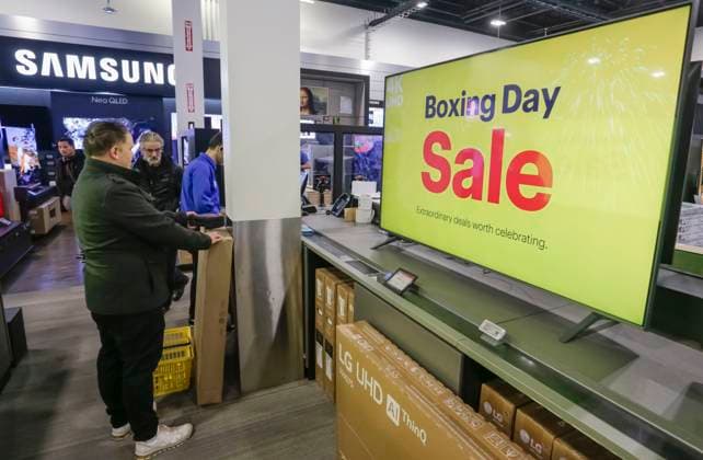 (231226) -- RICHMOND (CANADA), Dec. 26, 2023 -- People shop at a store on Boxing Day in Richmond, British Columbia, Canada, on Dec. 26, 2023. Boxing Day is one of the biggest shopping days in Canada. (Photo by Xinhua) CANADA-RICHMOND-BOXING DAY-SHOPPING LiangxSen 