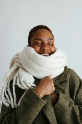 Creative Highlights Symbolbilder Happy woman wearing warm clothes against white background model released, Symbolfoto, EBSF04148