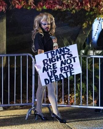 December 28, 2023: Vinny Torres, who performs as Skinny Mocha, holds a sign that says, Trans rights are not up for debate. Anti-transgender activists Chris Elston and Chloe Cole spoke at the Fisher Science building at Cal Poly in early December. Cole and other conservatives say transgender people regret gender-affirming surgery, but recent research says the vast majority do not. - ZUMAm67_ 20231228_zaf_m67_003 Copyright: xDavidxMiddlecampx