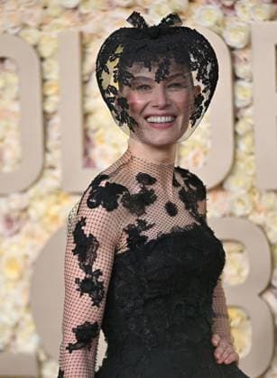 Actress Rosamund Pike arrives for the 81st annual Golden Globe Awards at the Beverly Hilton in Beverly Hills, California on Sunday, January 7, 2024.  LAP202401070072 CHRISxCHEW