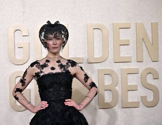 Actress Rosamund Pike arrives for the 81st annual Golden Globe Awards at the Beverly Hilton in Beverly Hills, California on Sunday, January 7, 2024.  LAP202401070073 CHRISxCHEW