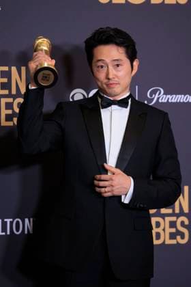 January 7, 2024, Beverly Hills, California, USA: Steven Yeun in the press room of the 81st Annual Golden Globe Awards on Sunday January 7, 2024 at the The Beverly Hilton Hotel in Beverly Hills, California. ARIANA RUIZ PI Beverly Hills USA - ZUMAp124 20240107_zaa_p124_012 Copyright: xArianaxRuizx