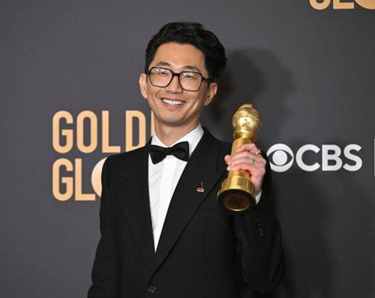 Lee Sung Jin appears backstage after winning the award for Best Limited Series, Anthology Series, or Motion Picture Made for Television award for Beef, during the 81st annual Golden Globe Awards at the Beverly Hilton in Beverly Hills, California on Sunday, January 7, 2024.  LAP202401070257 CHRISxCHEW
