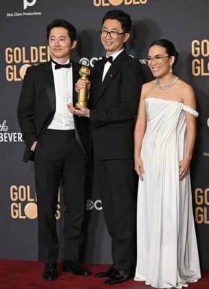 (L-R) Steven Yeun, Lee Sung Jin and Ali Wong appear backstage after winning the award for Best Performances in a Limited Series, Anthology Series, or Motion Picture Made for Television award for Beef, during the 81st annual Golden Globe Awards at the Beverly Hilton in Beverly Hills, California on Sunday, January 7, 2024.  LAP202401070260 CHRISxCHEW