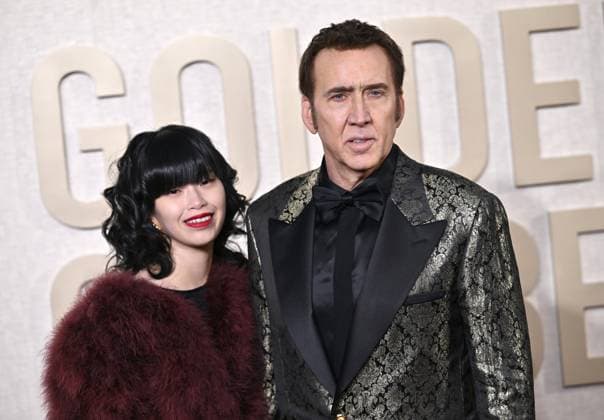 (L-R) Riko Shibata and Nicolas Cage arrive for the 81st annual Golden Globe Awards at the Beverly Hilton in Beverly Hills, California on Sunday, January 7, 2024.  LAP202401070242 CHRISxCHEW