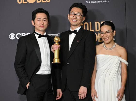 (L-R) Steven Yeun, Lee Sung Jin and Ali Wong appear backstage after winning the award for Best Performances in a Limited Series, Anthology Series, or Motion Picture Made for Television award for Beef, during the 81st annual Golden Globe Awards at the Beverly Hilton in Beverly Hills, California on Sunday, January 7, 2024.  LAP202401070261 CHRISxCHEW