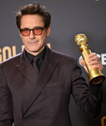 Robert Downey Jr., winner of the Best Performance by a Male Actor in a Supporting Role in any Motion Picture award for Oppenheimer, during the 81st annual Golden Globe Awards at the Beverly Hilton in Beverly Hills, California on Sunday, January 7, 2024.  LAP202401070324 CHRISxCHEW