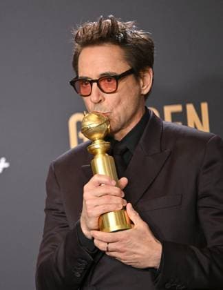 Robert Downey Jr., winner of the Best Performance by a Male Actor in a Supporting Role in any Motion Picture award for Oppenheimer, during the 81st annual Golden Globe Awards at the Beverly Hilton in Beverly Hills, California on Sunday, January 7, 2024.  LAP202401070326 CHRISxCHEW