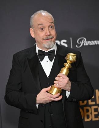 Paul Giamatti, winner of the Best Performance by an Actor in a Motion Picture, Musical or Comedy award for The Holdovers during the 81st annual Golden Globe Awards at the Beverly Hilton in Beverly Hills, California on Sunday, January 7, 2024.  LAP202401070338 CHRISxCHEW