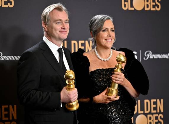 (L-R) Christopher Nolan and Emma Thomas, winners of the Best Motion Picture - Drama for Oppenheimer, during the 81st annual Golden Globe Awards at the Beverly Hilton in Beverly Hills, California on Sunday, January 7, 2024.  LAP202401070350 CHRISxCHEW