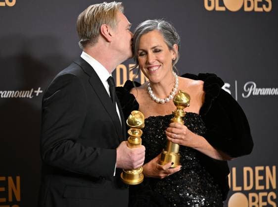 (L-R) Christopher Nolan and Emma Thomas, winners of the Best Motion Picture - Drama for Oppenheimer, during the 81st annual Golden Globe Awards at the Beverly Hilton in Beverly Hills, California on Sunday, January 7, 2024.  LAP202401070351 CHRISxCHEW
