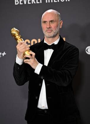 Jesse Armstrong, winner of the Best Television Series - Drama for Succession, during the 81st annual Golden Globe Awards at the Beverly Hilton in Beverly Hills, California on Sunday, January 7, 2024.  LAP202401070354 CHRISxCHEW