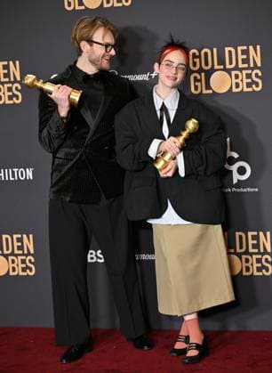 (L-R) FINNEAS and Billie Eilish appear backstage after winning the award for the Best Original Song, Motion Picture award for Barbie ? What Was I Made For? during the 81st annual Golden Globe Awards at the Beverly Hilton in Beverly Hills, California on Sunday, January 7, 2024.  LAP202401070304 CHRISxCHEW