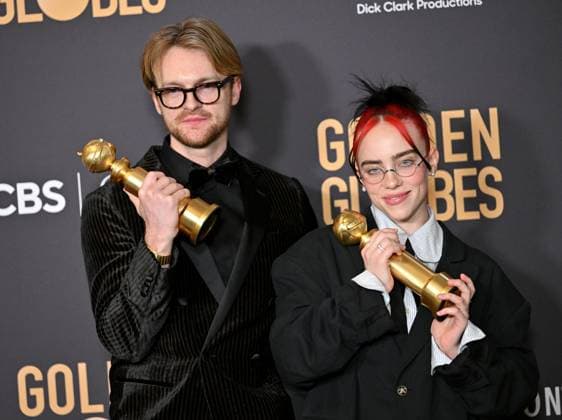 (L-R) FINNEAS and Billie Eilish appear backstage after winning the award for the Best Original Song, Motion Picture award for Barbie ? What Was I Made For? during the 81st annual Golden Globe Awards at the Beverly Hilton in Beverly Hills, California on Sunday, January 7, 2024.  LAP202401070307 CHRISxCHEW