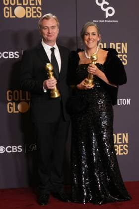 January 7, 2024, Beverly Hills, CA, USA: (L-R) Christopher Nolan and Emma Thomas, winners of the Best Motion Picture - Drama for Oppenheimer, pose in the press room during the 81st Annual Golden Globe Awards at The Beverly Hilton on January 07, 2024 in Beverly Hills, California. Beverly Hills USA - ZUMAs181 20240107_zea_s181_387 Copyright: xCraSHx