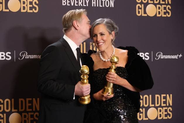 January 7, 2024, Beverly Hills, CA, USA: (L-R) Christopher Nolan and Emma Thomas, winners of the Best Motion Picture - Drama for Oppenheimer, pose in the press room during the 81st Annual Golden Globe Awards at The Beverly Hilton on January 07, 2024 in Beverly Hills, California. Beverly Hills USA - ZUMAs181 20240107_zea_s181_390 Copyright: xCraSHx