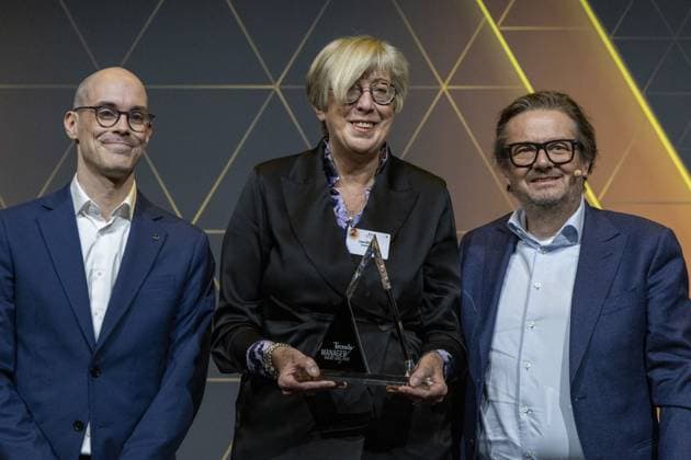 Stijn Fockedey, Euroclear s Lieve Mostrey and Belgian businessman Marc Coucke pictured during the 39th award ceremony for the Manager of the Year, Wednesday 10 January 2024 in Brussels. Flemish business magazine Trends, french-speaking counterpart Trends-Tendance, in collaboration with television channel Kanaal Z Canal Z, have a yearly tradition of electing a Flemish and a French-speaking manager of the year.  NICOLASxMAETERLINCK 83757755
