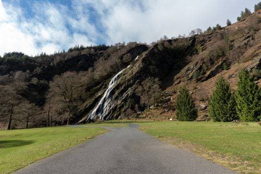 A road leading to the Great Powerscourt Waterfall cascade in Wicklow, Ireland 2112629 RECORD DATE NOT STATED