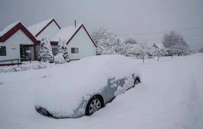 (240117) -- VANCOUVER, Jan. 17, 2024 -- A car is seen covered with snow in Vancouver, British Columbia, Canada, on Jan. 17, 2024. Environment Canada issued a snowfall warning for the province of British Columbia on Wednesday. The Metro Vancouver region saw up to 20 centimetres of snow, causing schools to close and flights to be delayed and cancelled. (Photo by Xinhua) CANADA-VANCOUVER-HEAVY SNOW LiangxSen 