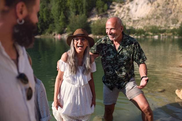 Happy multigeneration family on summer holiday, having fun by lake. Portrait of happy multigeneration family on summer holiday, having fun by lake. model released Copyright: xx Family_Lake_Holidays_2021_140