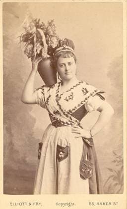 Minnie Walton (1852?-1879) Minnie Walton was an actress. She was a member of the company that performed for the opening of the California Theatre in San Francisco in 1869. Walton died in San Francisco. The San Francisco Call, a California newspaper, recorded the death of a Minnie Walton Lyster in 1879 at age twenty-seven. On this carte de visite from the Elliott & Fry studio in London, Walton poses in a peasant costume, balancing a jar of flowers on her shoulder. EDITORIAL USE ONLY Copyright: xx MES26260 Elliottx&xFryx picturehistory010305