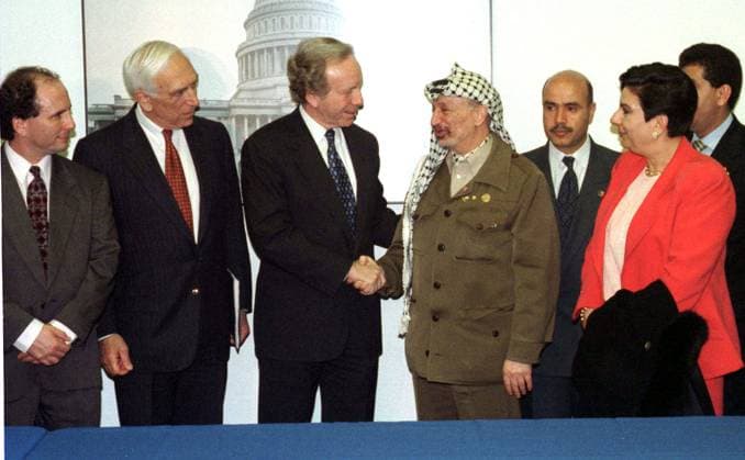 Lieberman Meets Arafat and Palestinian Leaders Washington, DC - March 4, 1997 - Palestinian Leader Yassir Arafat is welcomed to a meeting with United States Senators by United States Senator Joseph I. Lieberman (Independent Democrat of Connecticut). (L-R) United States Senator Paul Wellstone (Democrat of Minnesota), United States Senator Frank Lautenberg (Democrat of New Jersey), Senator Lieberman, Chairman Arafat, Palestinian Representative to the United States Hassan Rahman, and Palestinian Cabinet member Hanan Ashrawi. Credit: Ron Sachs CNP Washington District of Columbia United States EDITORIAL USE ONLY Copyright: xx RonxSachsx cnpphotos012164