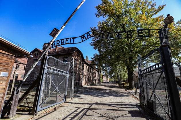 October 13, 2022, Auschwitz, Poland, Poland: The main gate of the entrance into Auschwitz. The motto above the gate, Arbeit macht frei (Work Sets You Free), made by prisoners, who deliberately reversed the letter B as a hidden gesture of rebellion...January 27 marks the anniversary of AuschwitzÃ¢â‚¬â ¢s liberation by Soviet soldiers. Operated by the Nazi regime between May 1940-January 1945, the Polish government has maintained its preservation since the fall of the war. It is also a UNESCO site. Auschwitz Poland - ZUMAo116 20221013_znp_o116_074 Copyright: xBiancaxOterox