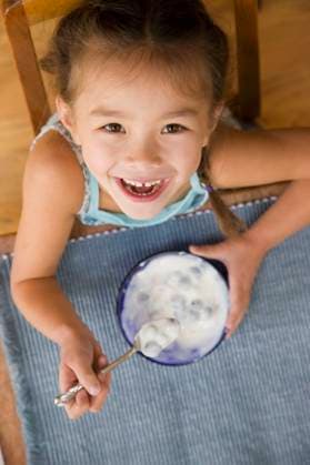 Mixed race young girl eating yogurt with spoon Seattle, WA, 21.12.2023, model released, TTBB_BLD068150.jpg, 4-5 years, anticipation, asian ethnicity, blueberry, bowl, breakfast, caucasian, childhood, close up, color image, directly above, domestic life, eating, elementary age, enjoying, food and drink, girl, grinning, happy, head and shoulders, healthy eating, high angle view, holding, hungry, indoors, japanese ethnicity, lifestyle, looking at camera, looking up, mixed race person, nourishing, nutrition, one girl only, one person, people, photography, portrait, sitting, smiling, snack, snacking, spoon, table, vertical, wholesome, yogurt, minority, minoritiesappreciating, asian, bliss, cheerful, child, children, close-up, closeup, color, co Copyright: xDonxMasonx