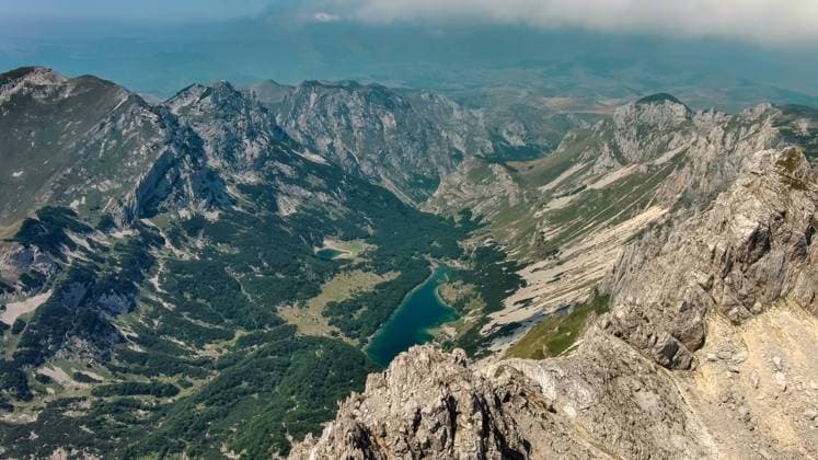 Mountains and lake in park Durmitor Aerial view of mountains and lake in park Durmitor, Montenegro Copyright: xZoonar.com Kokhanchikovx 20911809