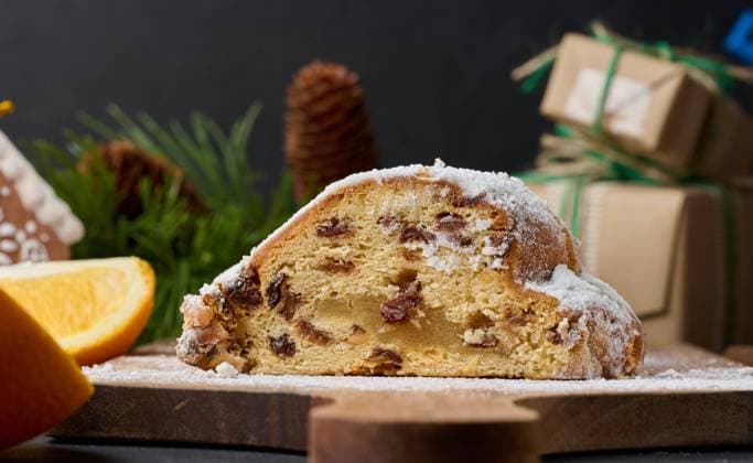 Christmas pastries stollen sprinkled with powdered sugar on the table, festive dessert Christmas pastries stollen sprinkled with powdered sugar on the table, festive dessert Copyright: xZoonar.com DANKOxNx 20923768